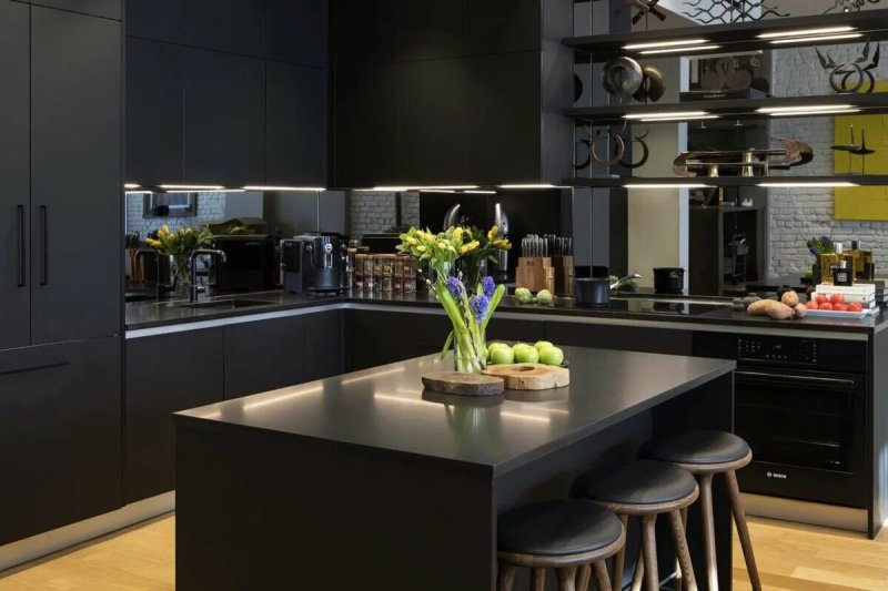 Black kitchen in the interior