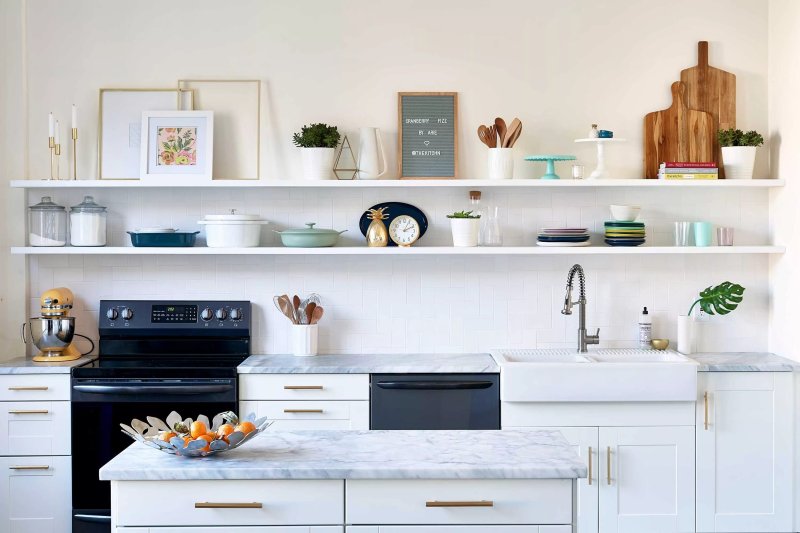 Kitchen with hinged shelves