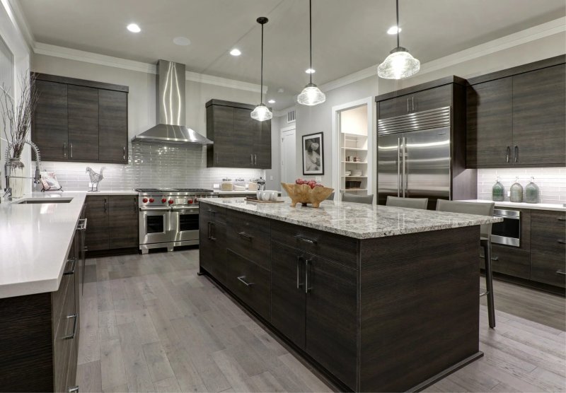 Kitchen with a dark floor design