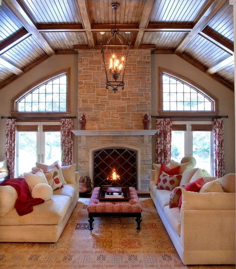 Living room in the style of a chalet with a fireplace