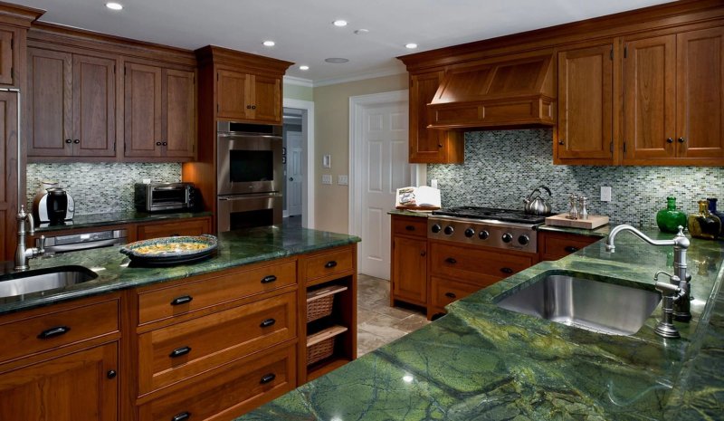 Kitchen with a green countertop