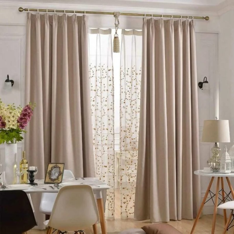 Beige curtains in the interior