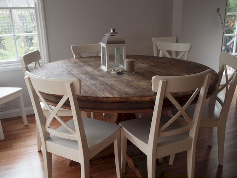 Round dining table in the style of loft