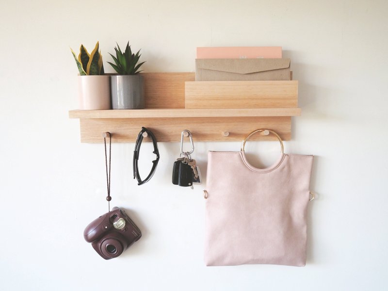 Wooden shelf with hooks