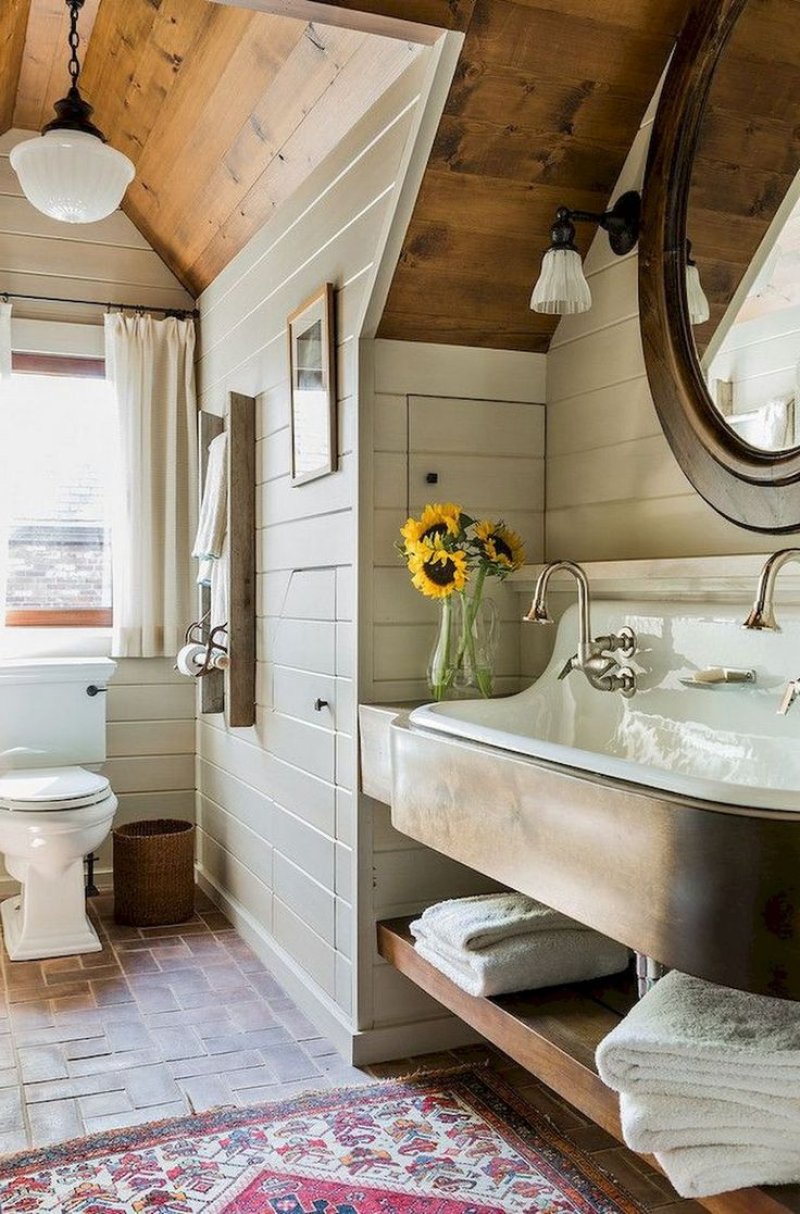 Bathroom in a log house in the style of Provence