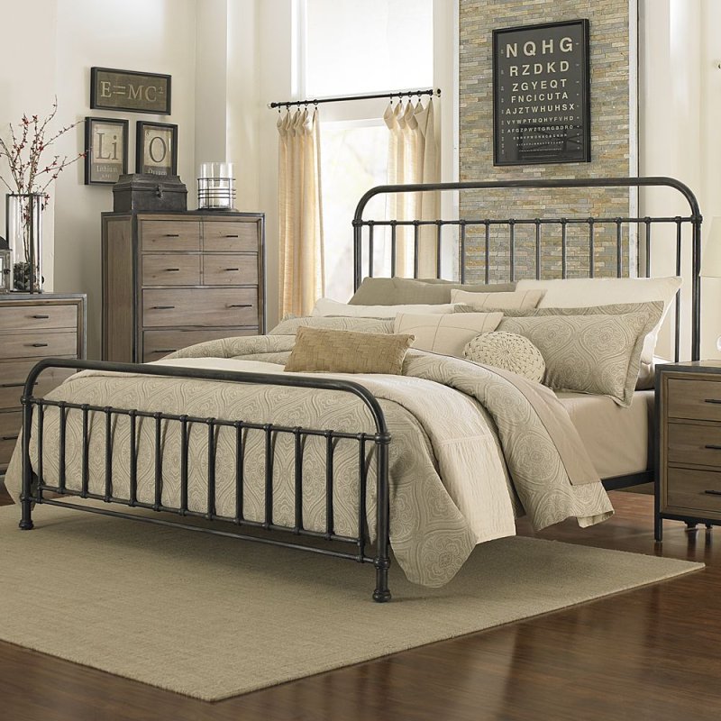 Metal bed in the interior of the bedroom