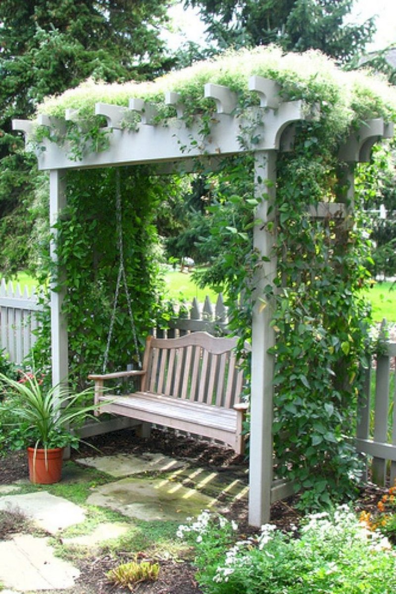 Pergola with a bench shady garden