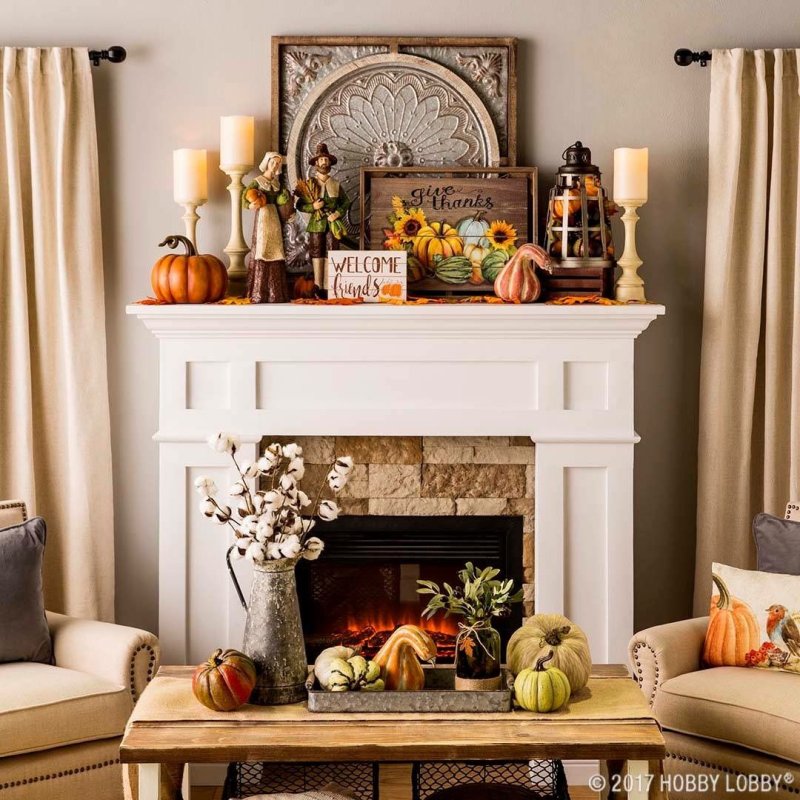 The autumn decor of the fireplace