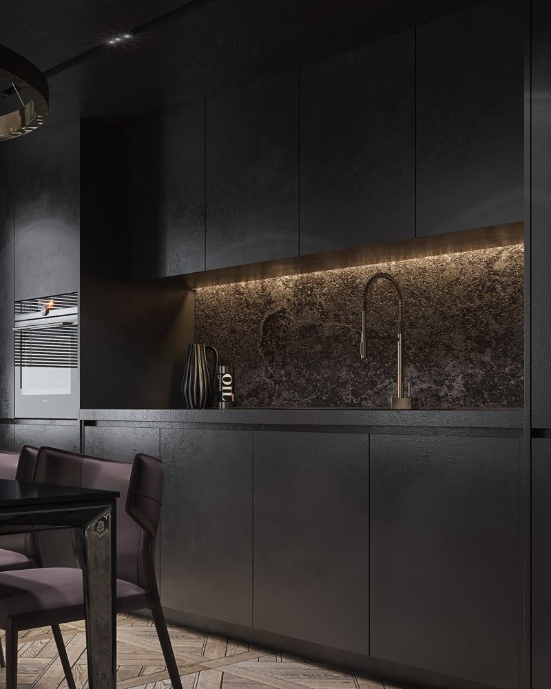 The interior of the kitchen in dark colors