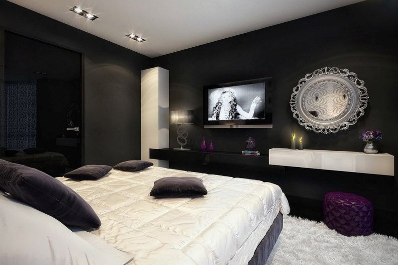 The interior of the bedroom in a modern style in dark colors