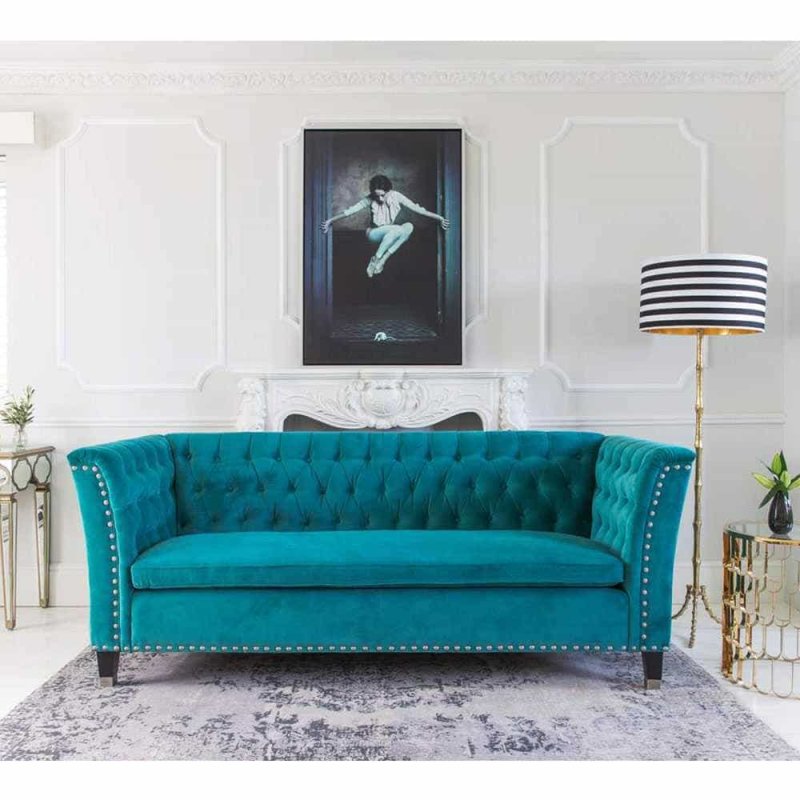 Turquoise sofa in the interior