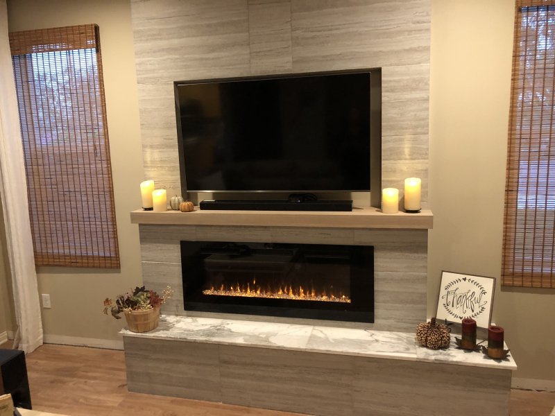 Fireplace in the interior of the living room in a modern style