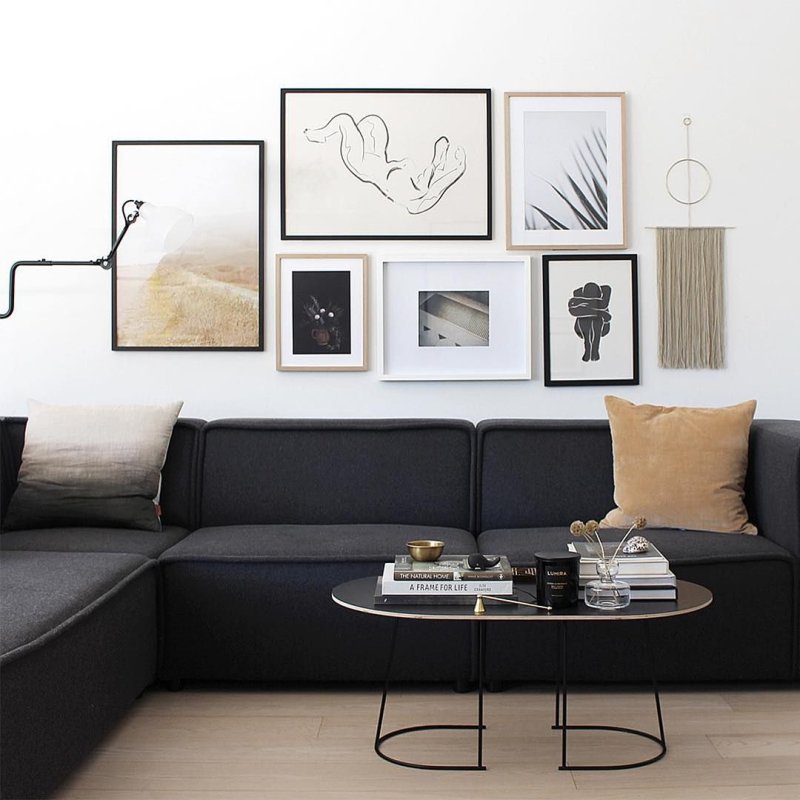 Black sofa in the interior of the living room