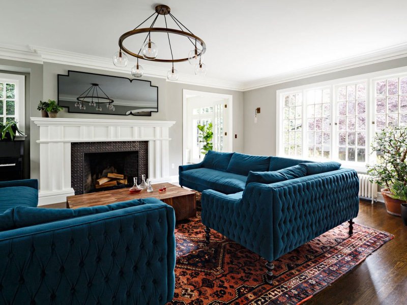 Living room with a blue sofa