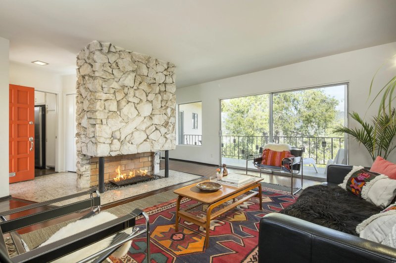 The fireplace is modern