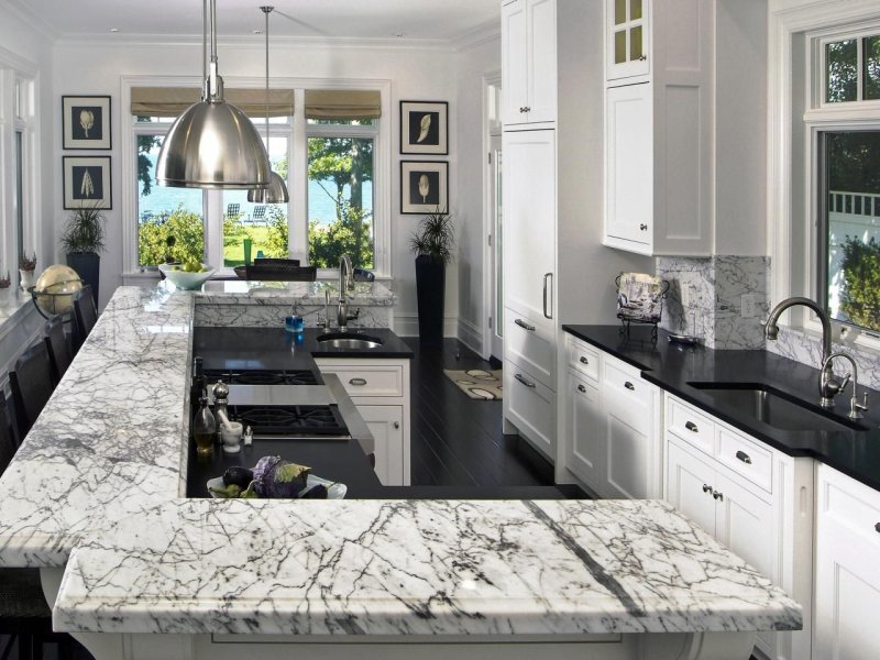 White kitchen with a marble tabletop