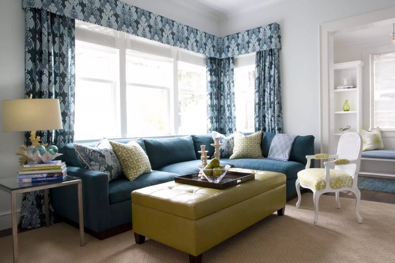 Blue sofa in the interior of the living room