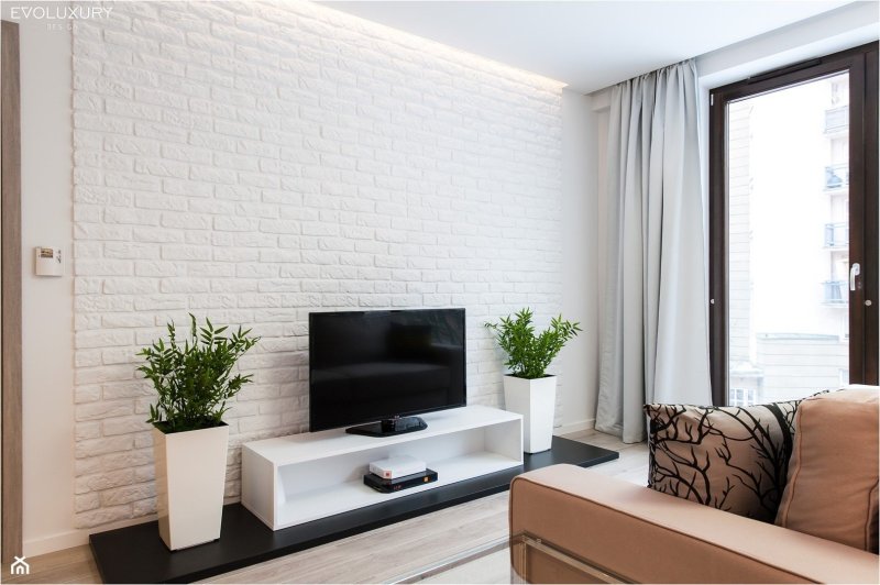 Living room with white brick