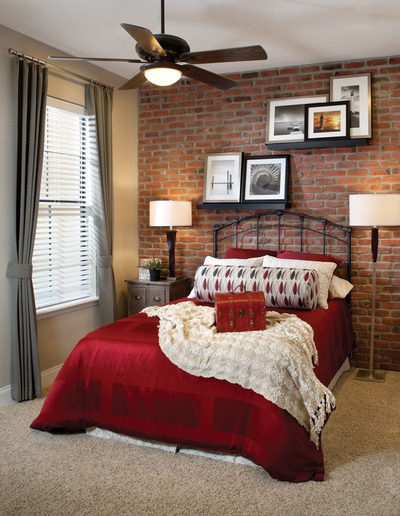 Brick wall in the interior of the bedroom