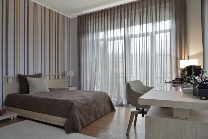 Curtains in the bedroom in a modern style