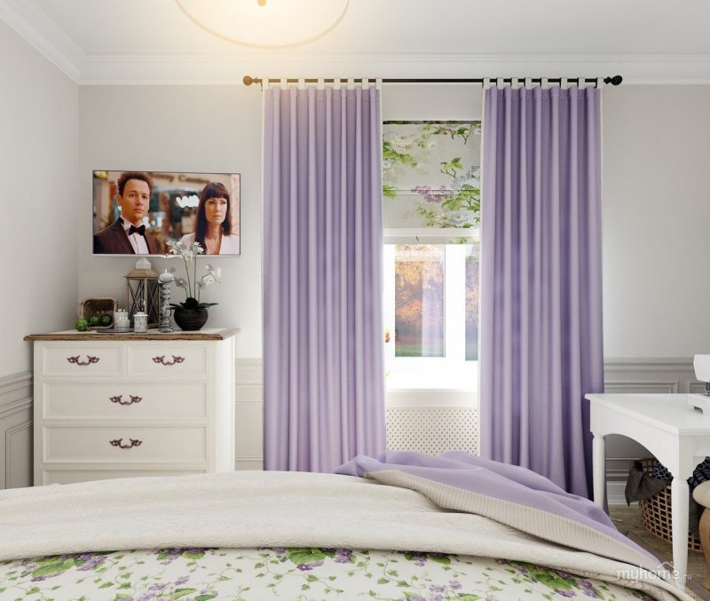 Lilac curtains in the interior of the bedroom