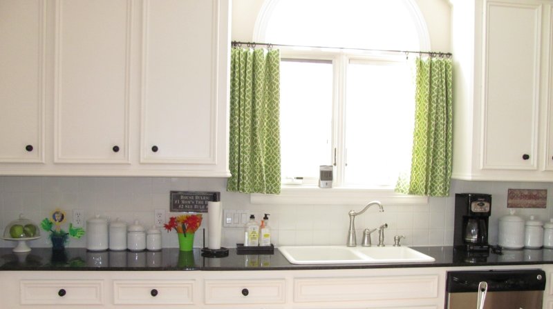 Curtains above the sink in the kitchen