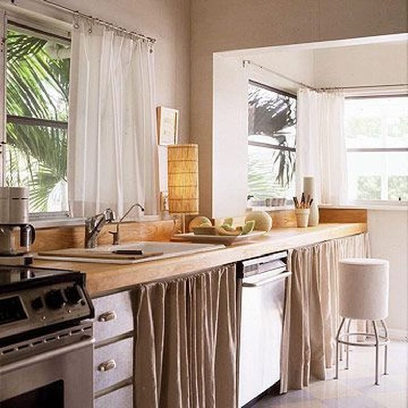 Kitchen with a curtain instead of facades