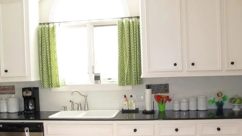 Curtains above the sink in the kitchen