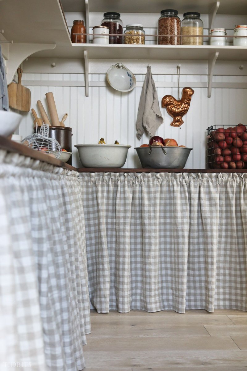 Kitchen with a curtain instead of facades