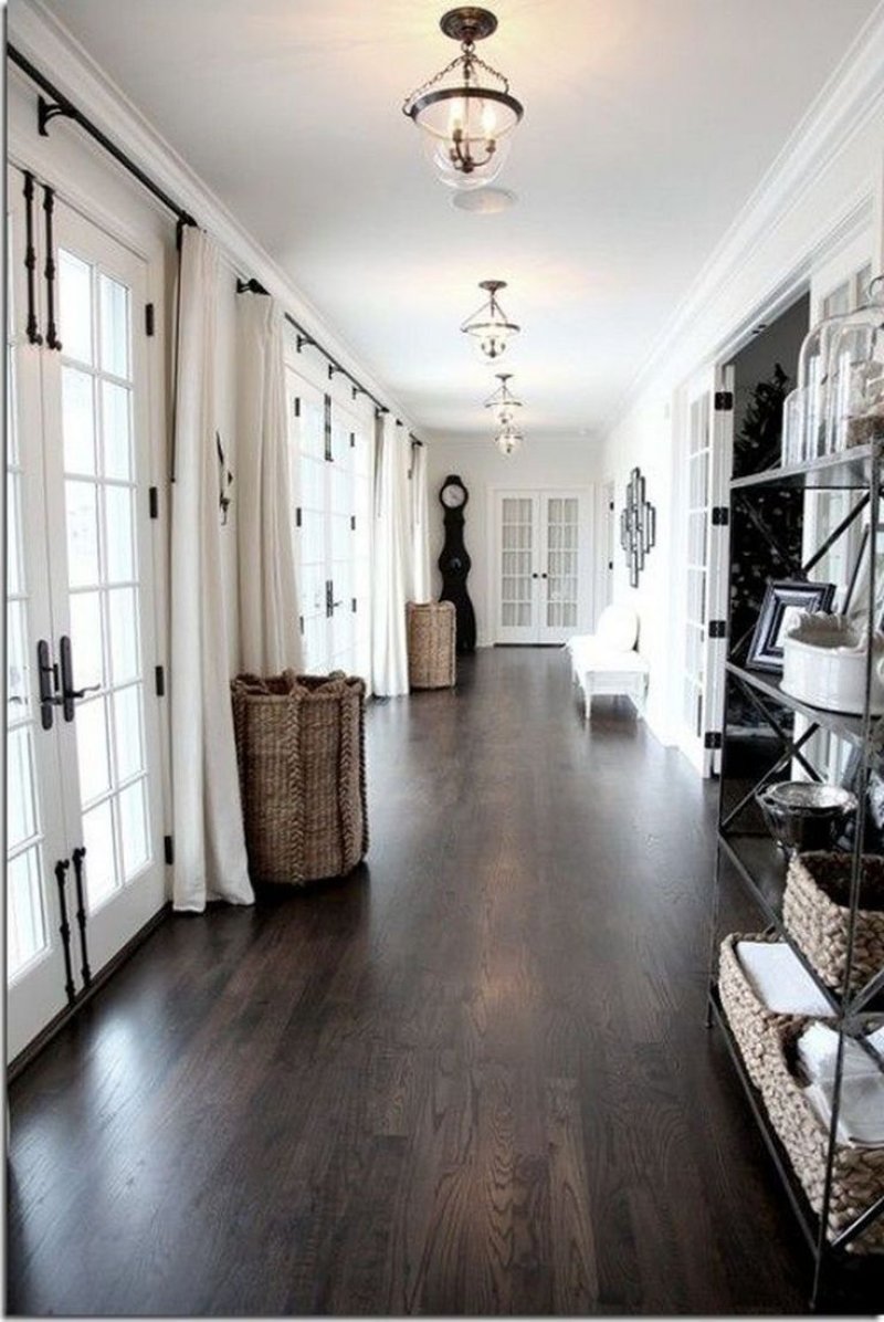 The interior of a long corridor in the apartment