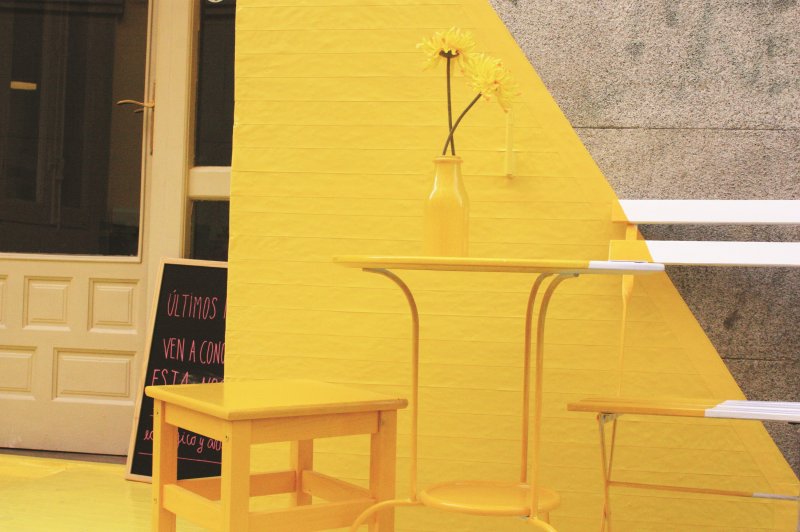 The yellow interior of the cafe