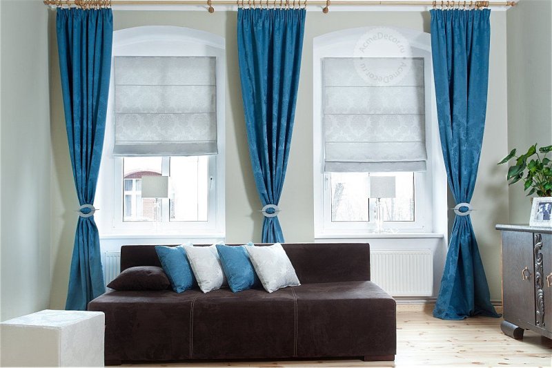 Blue curtains in the interior of the living room