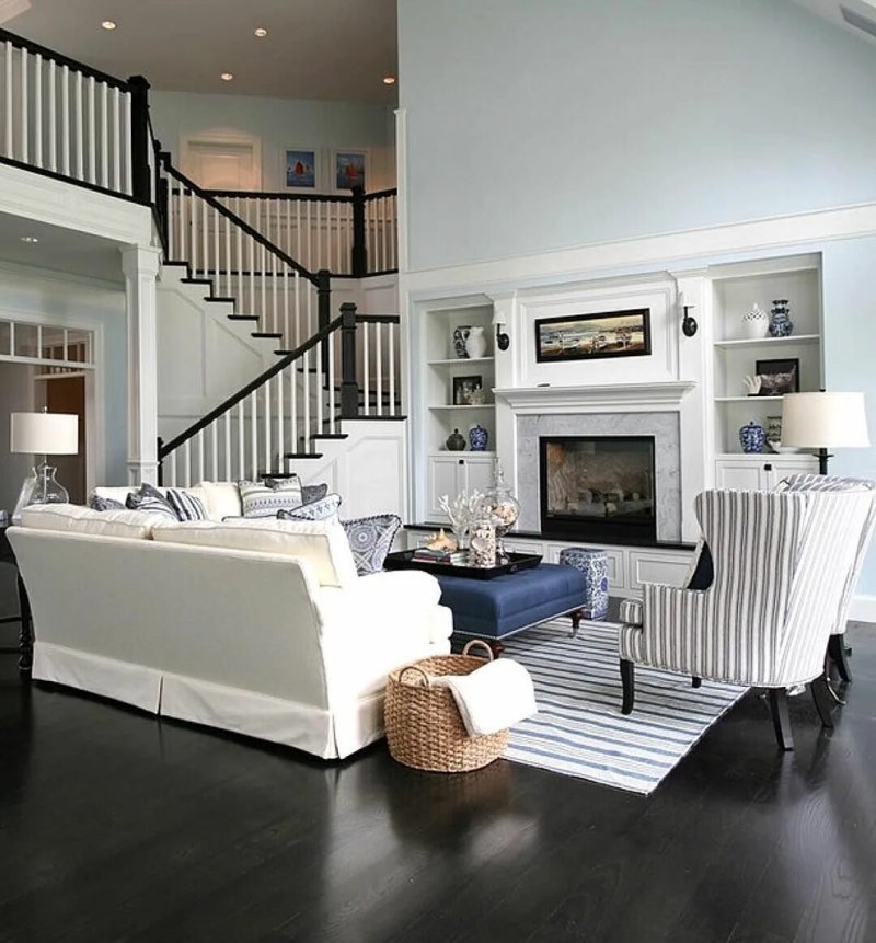 Living room with a staircase and fireplace