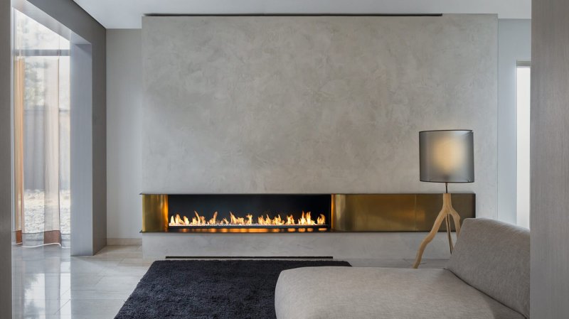 The fireplace is modern