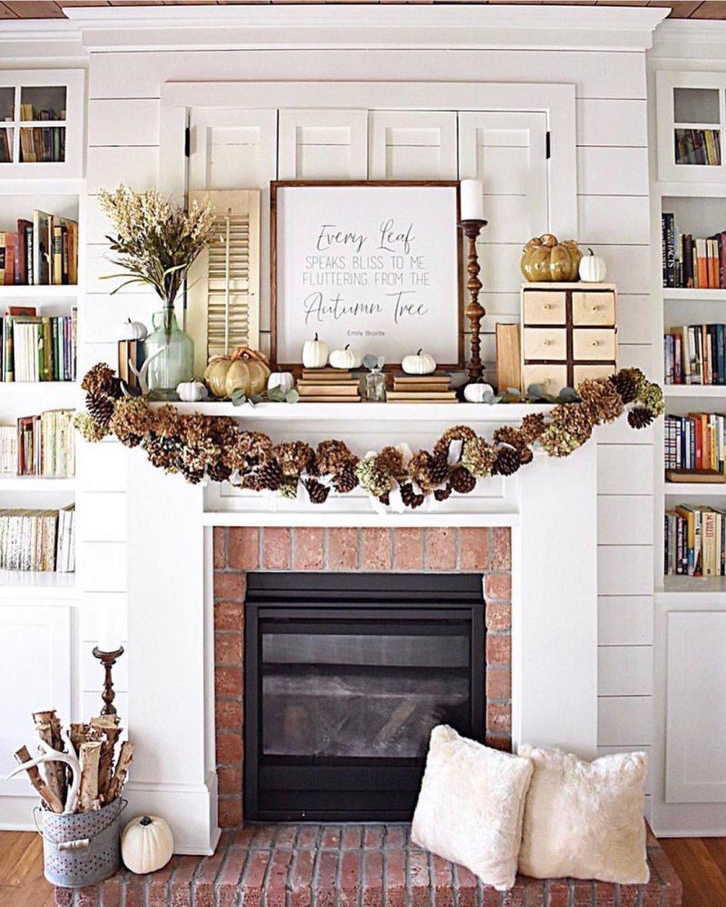 The autumn decor of the fireplace