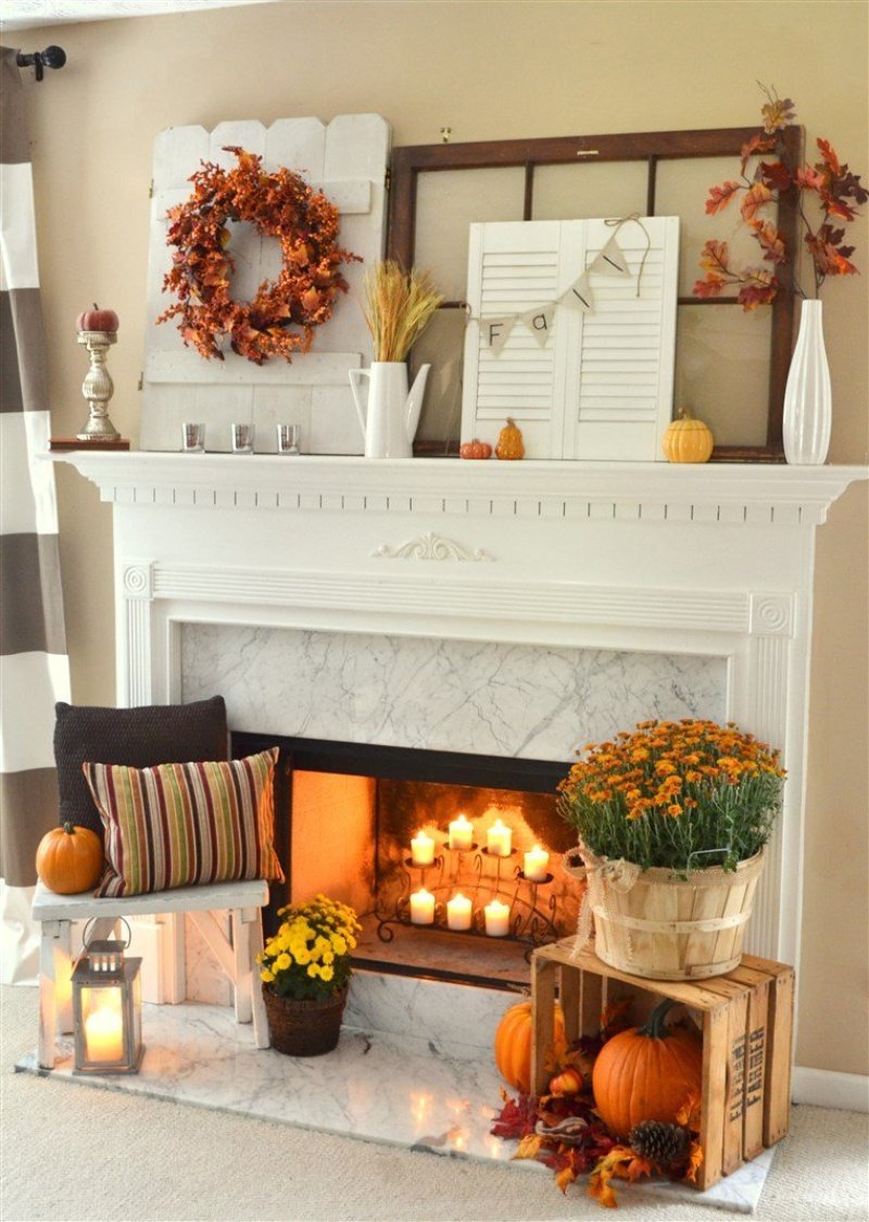 The autumn decor of the fireplace