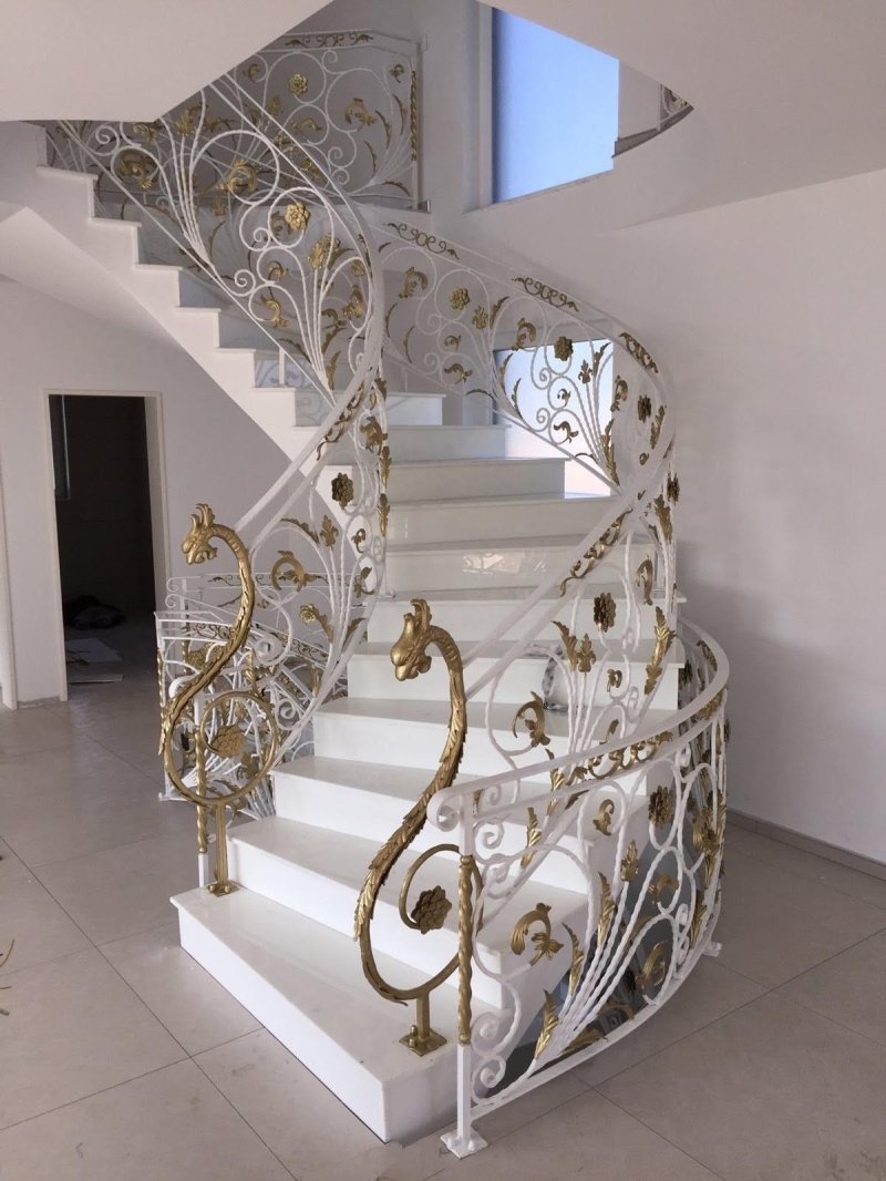 Forged railing on the stairs