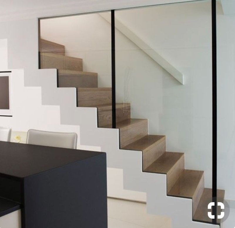 Staircase with glass railing