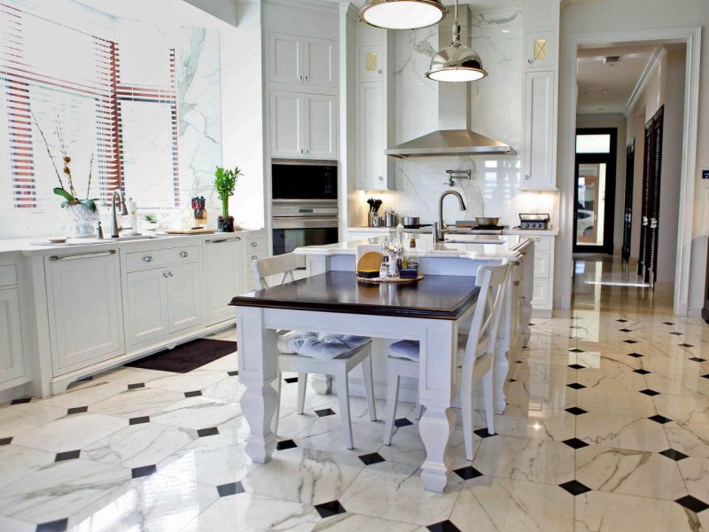 Kitchen with marble tiles on the floor