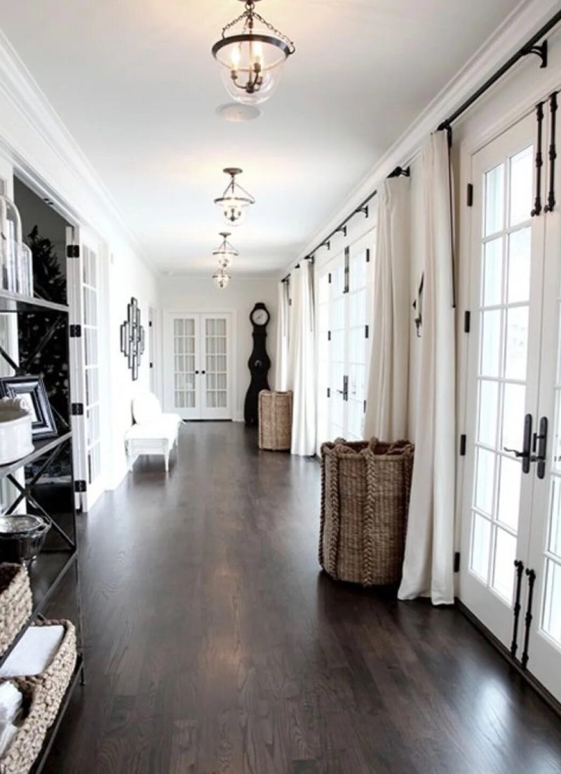 The interior of a long corridor in the apartment