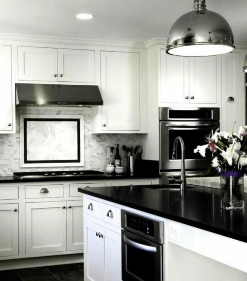 White kitchen with a black countertop