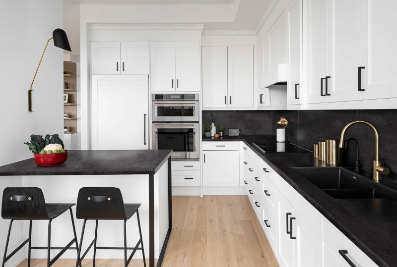 Gray kitchen with a black countertop