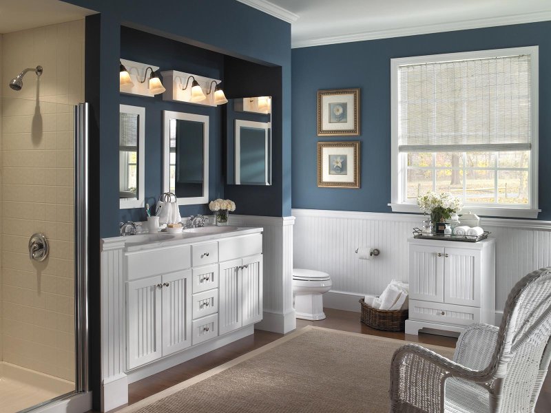 Blue furniture in the interior of the bathroom