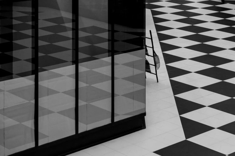 The tile is black white