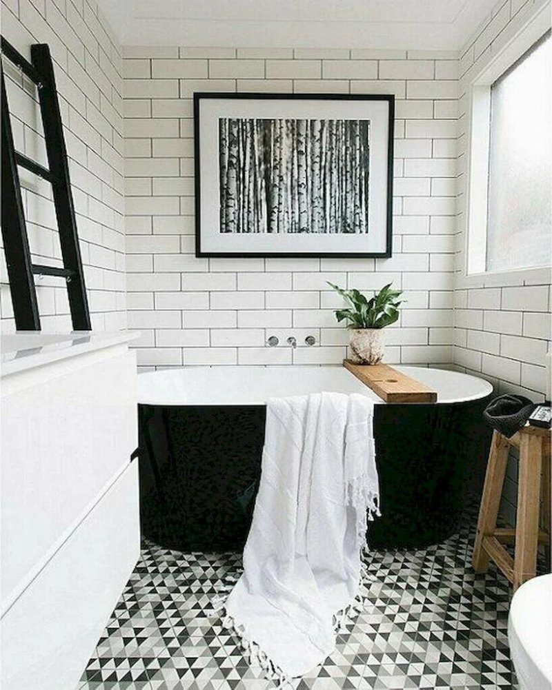 Bathroom with black and white tiles