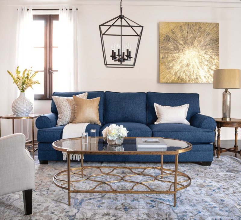 Blue sofa in the interior of the living room