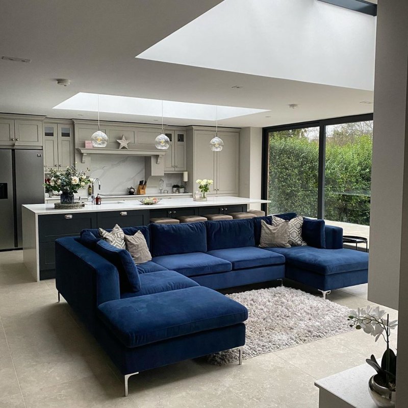 Living room with a blue sofa