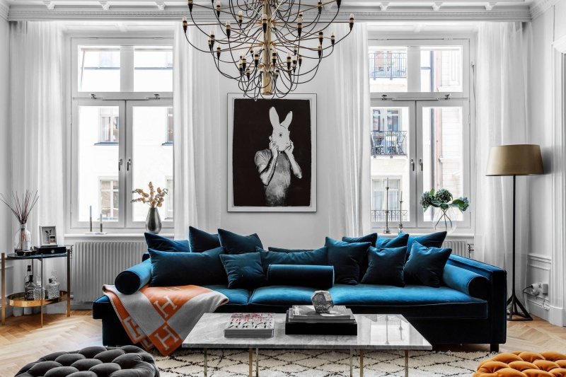 Skandi living room with a blue sofa