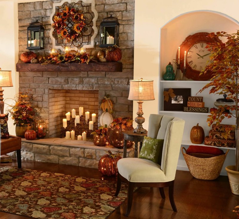 The autumn decor of the fireplace