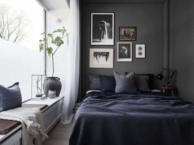 The bedroom is gray walls